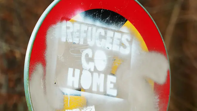 Sign saying &#x27;Refugees go home&#x27;