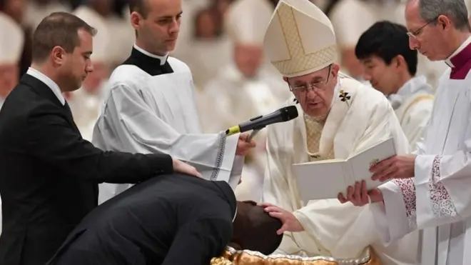 Pope Francis baptises Nigerian former beggar John Ogah at St Peter&#x27;s Basilica