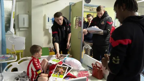 Sunderland footballers visit hospital children&#x27;s ward